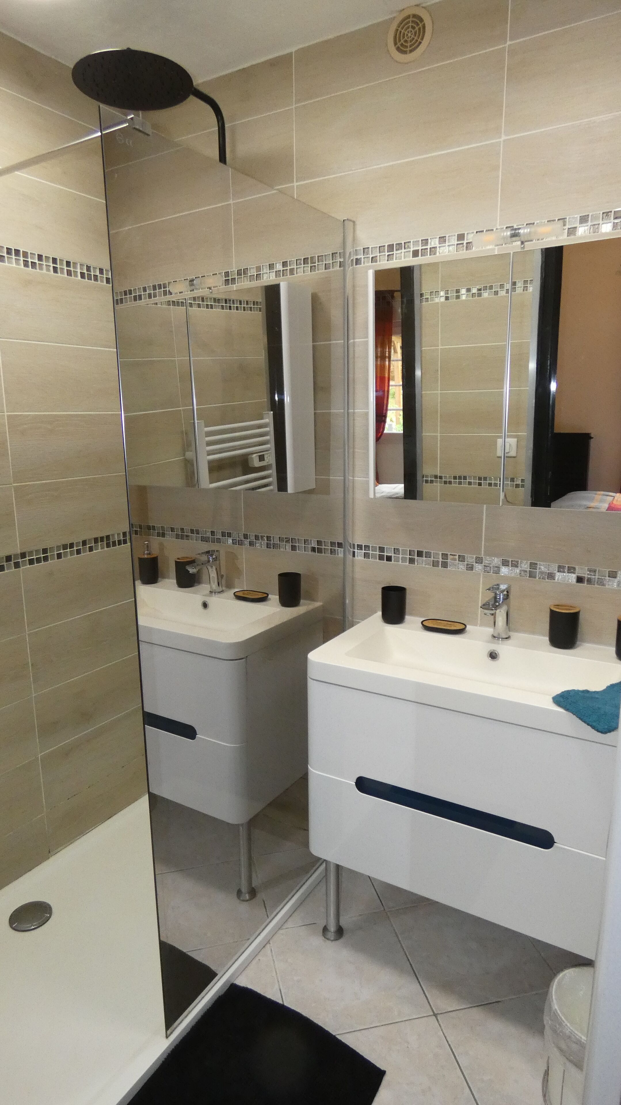 Shower, hair dryer, towels, toilet paper