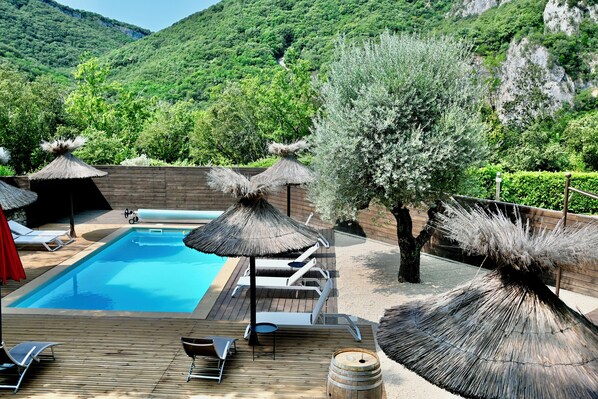 Seasonal outdoor pool, pool umbrellas, sun loungers