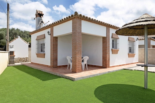 Charming Casita Torre de Meca 1 with Terrace, Garden, and Wi-Fi