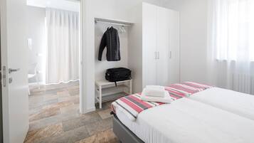 1 chambre, fer et planche à repasser, Wi-Fi gratuit, draps fournis