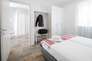 1 habitación, tabla de planchar con plancha, wifi gratis y ropa de cama 