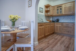 Apartment (1 Bedroom) | Living area | 17-inch flat-screen TV with cable channels, TV - Arcadia - 1 Bedroom Apartment - Tenby (Tenby)