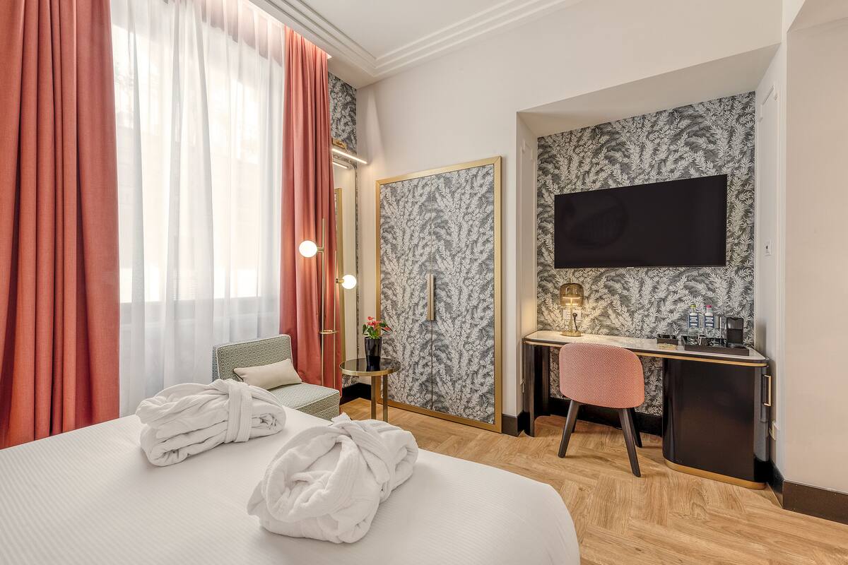 Premium bedding, down comforters, memory foam beds, minibar