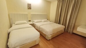 Habitación triple Deluxe | Wifi gratis y ropa de cama 