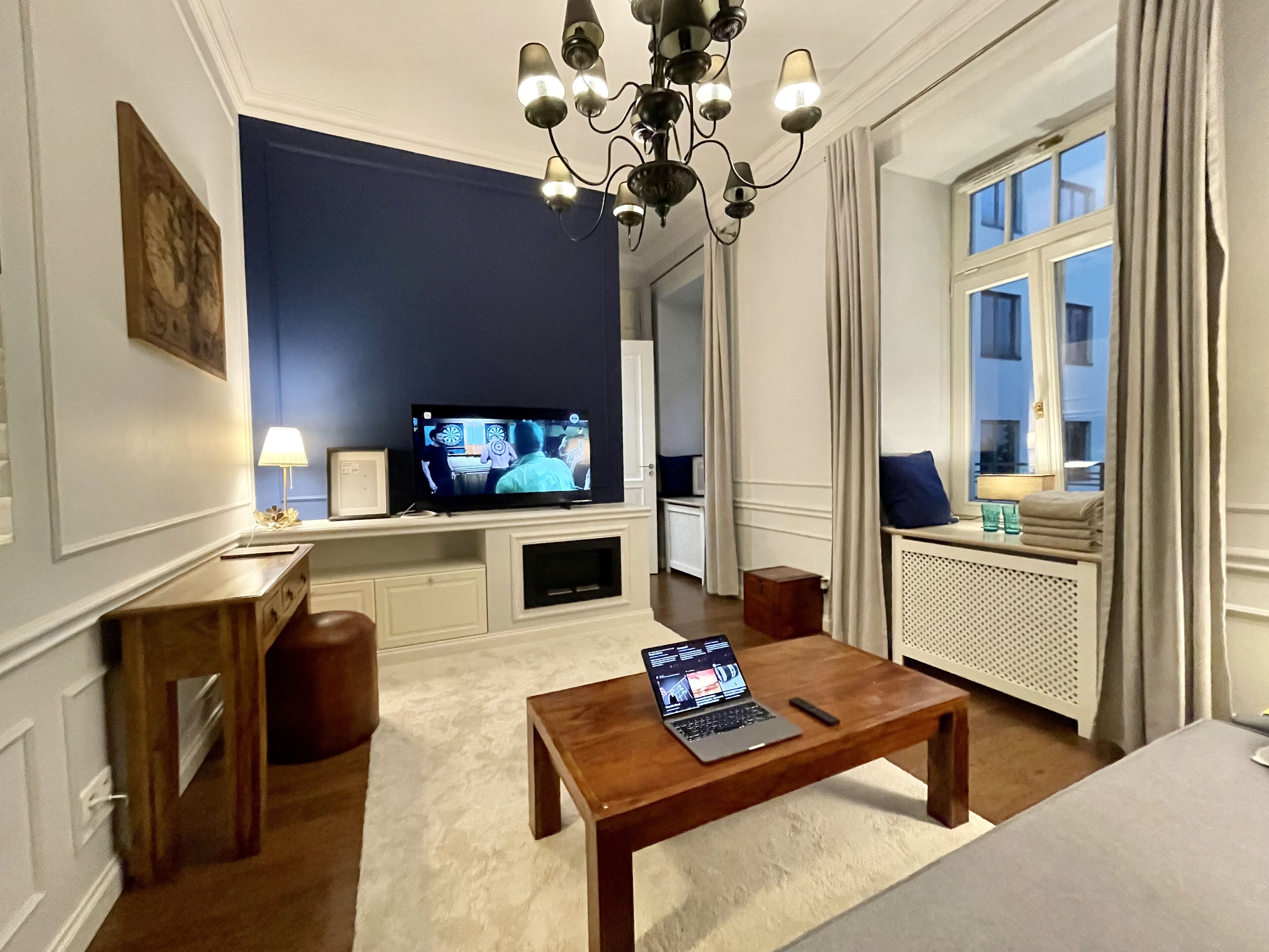 Smart TV, fireplace, books