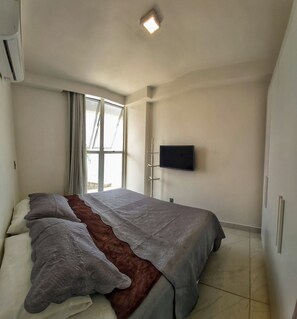 Apartamento panorâmico | Ferros/tábuas de passar roupa, Wi-Fi de cortesia, roupa de cama