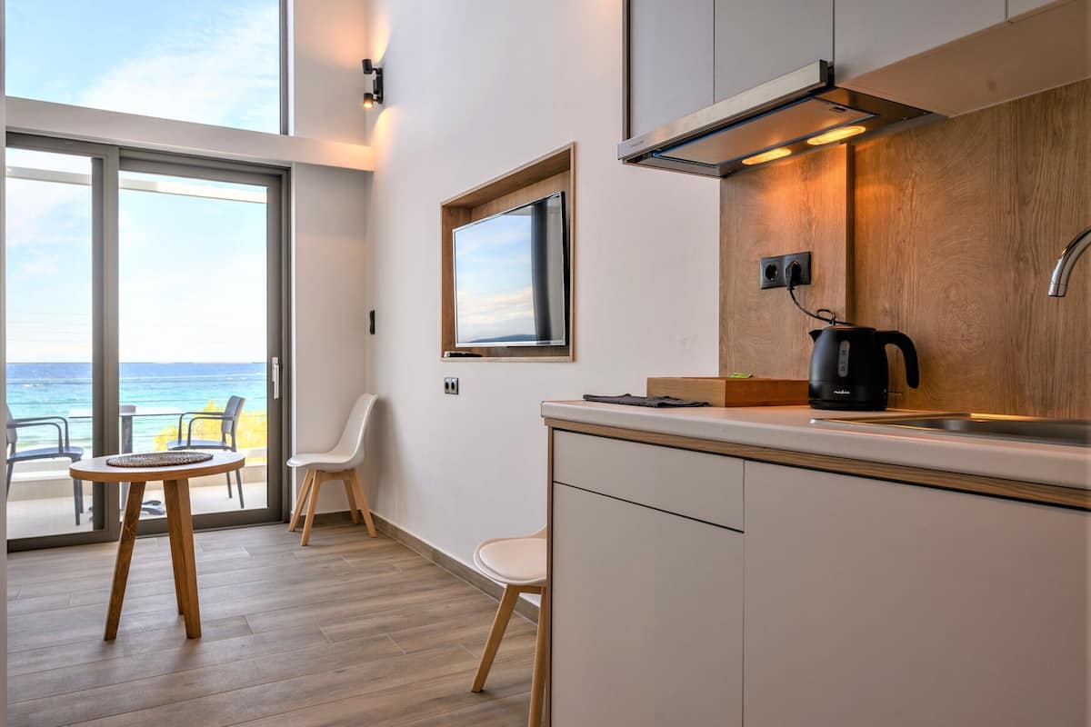 studio suite, sea view (6, duplex loft with balcony) | private kitchen | mini-fridge, stovetop, electric kettle, cookware/dishes/utensils