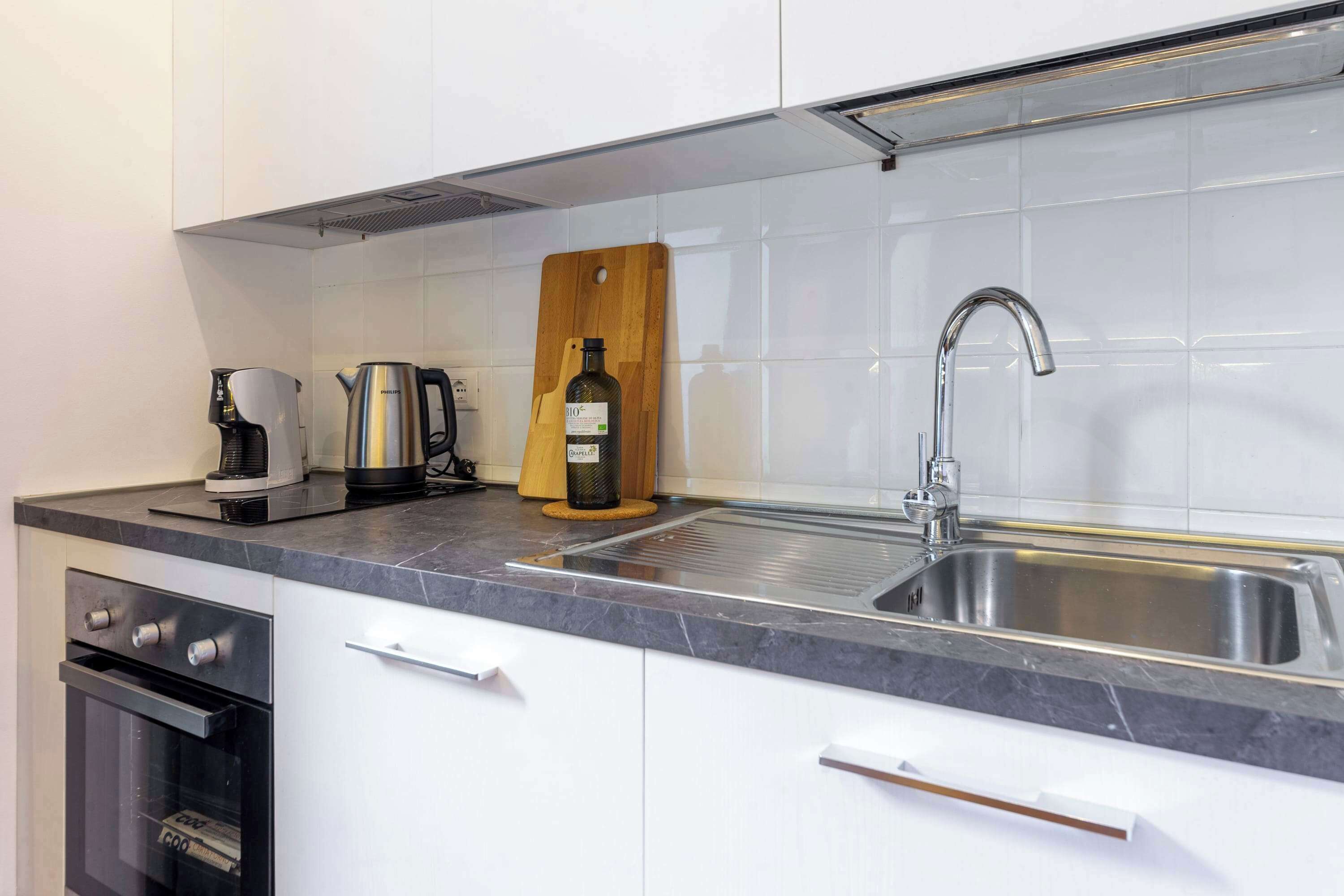 Fridge, oven, coffee/tea maker, cookware/dishes/utensils