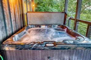 A hot tub with a wooden deck and a view of trees. - Mountain View Cabin w/ Hot Tub & Game Room (Blue Ridge)