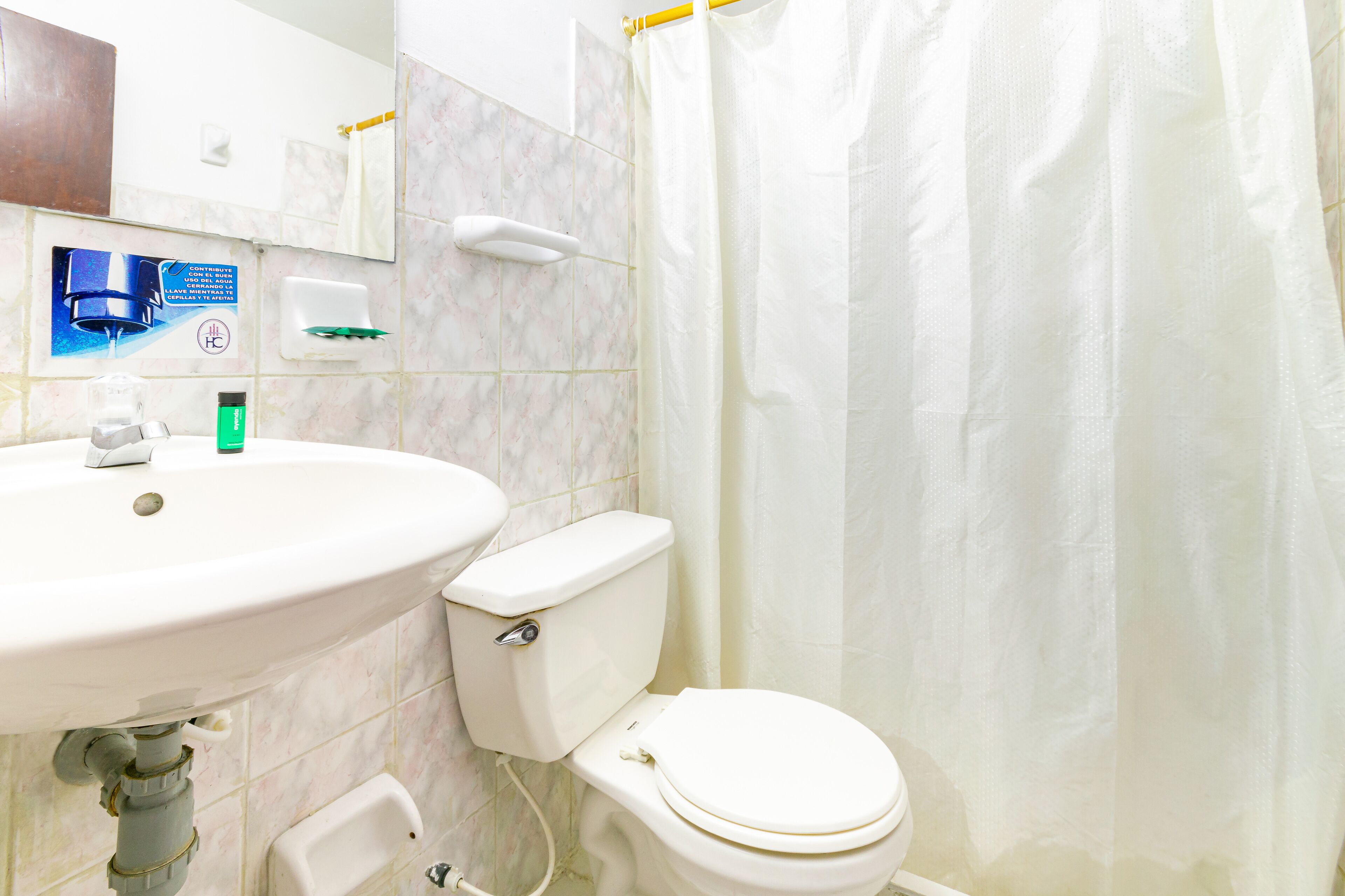 standard twin room | bathroom | shower, designer toiletries, towels, soap