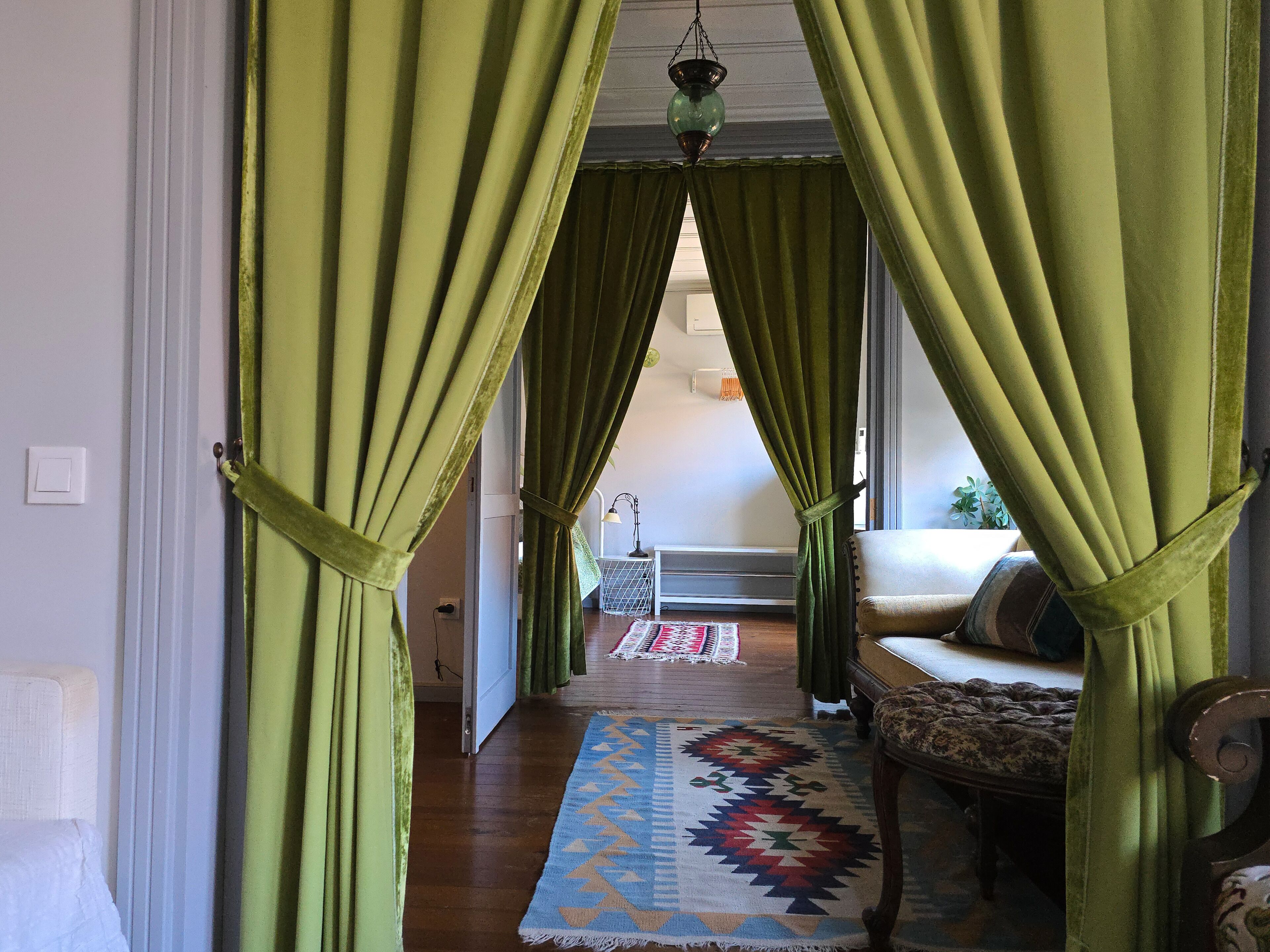 Green Olive Suite | Individually decorated, individually furnished, iron/ironing board
