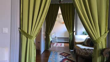 Green Olive Suite | Individually decorated, individually furnished, iron/ironing board
