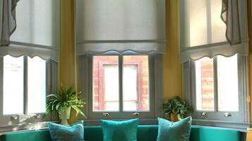 Yellow Mimosa Room | 1 bedroom, individually decorated, individually furnished
