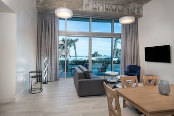 Room, 1 Bedroom (First Floor Walkout) | Living area | 65-inch flat-screen TV with cable channels, TV at Max Beach Resort