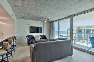 1 Bedroom Ocean View Residence | Living area | 65-inch flat-screen TV with cable channels, TV