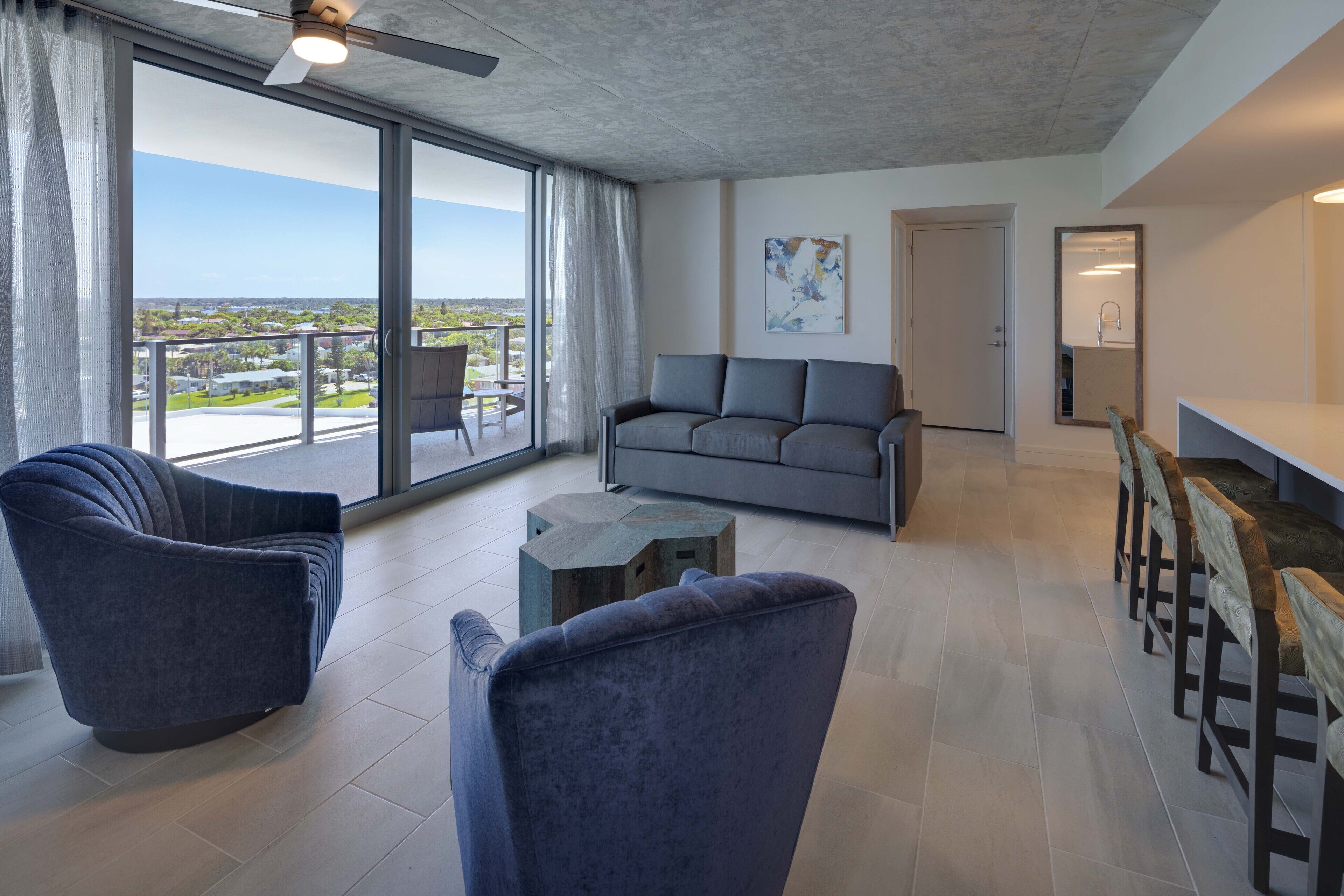 2 bedroom ocean & city south view residence | living area | 65-inch flat-screen tv with cable channels, tv