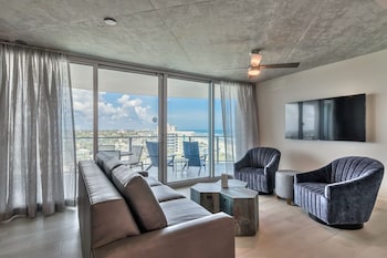 2 Bedroom Ocean & City North View Residence | Living area | 65-inch flat-screen TV with cable channels, TV at Max Beach Resort