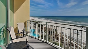 A balcony with a view of the beach and ocean. - Aqua #404 by Resort Collection (Panama City Beach)