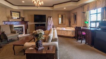 Suite, 1 Queen bed, Fireplace, Jacuzzi | 1 phòng ngủ, bàn ủi/dụng cụ ủi quần áo