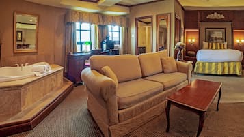 Suite, 1 Queen bed, Fireplace, Jacuzzi | 1 phòng ngủ, bàn ủi/dụng cụ ủi quần áo
