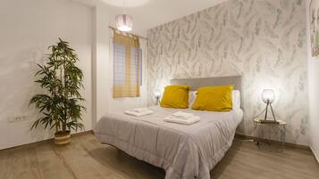 2 slaapkamers, een strijkplank/strijkijzer, gratis wifi, beddengoed