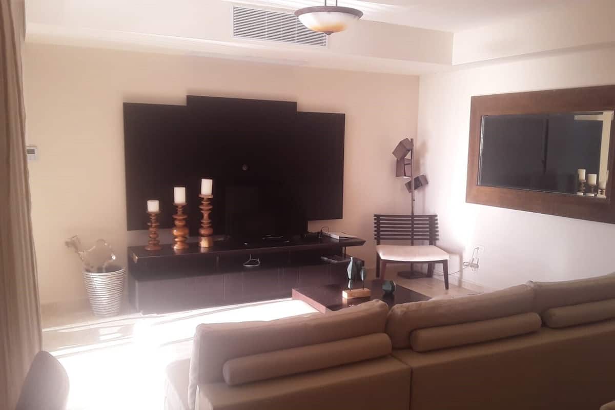 Luxury Villa, 3 Bedrooms, Balcony, Ocean View | Living area | 32-inch LED TV with cable channels, TV, streaming services
