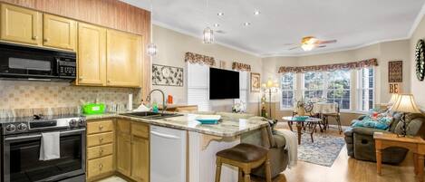 Condo, 2 Bedrooms (4604 C) | Private kitchen | Fridge, cookware/dishes/utensils