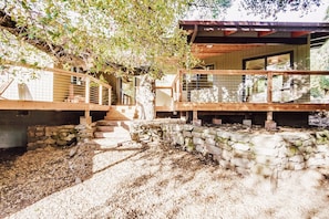 Experience the perfect blend of comfort and natural surroundings in this cozy cabin with a spacious deck and expansive views.