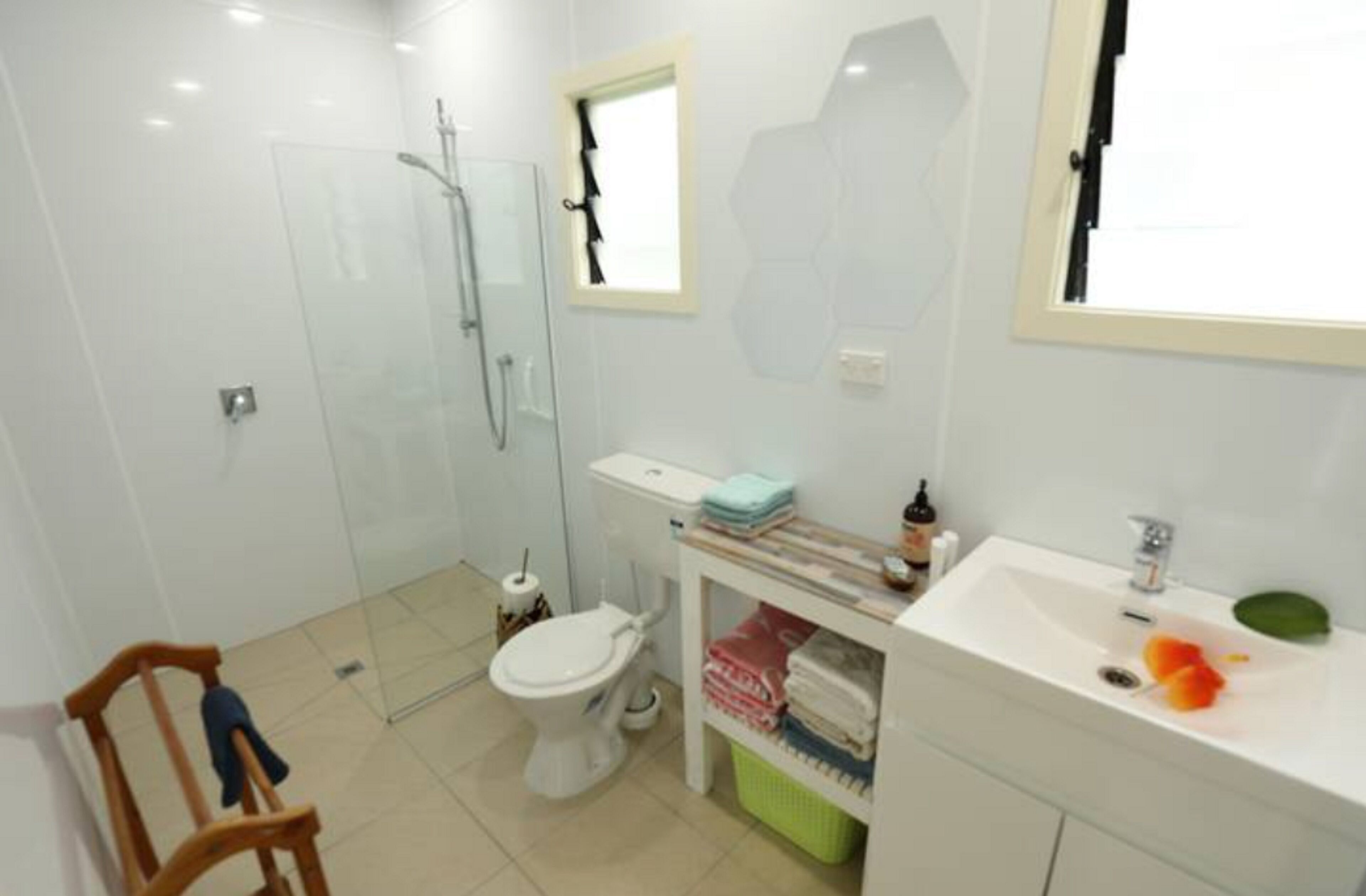 Shower, hair dryer, towels, soap