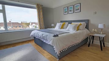 Individually decorated, desk, blackout curtains, iron/ironing board