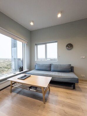 Comfort Cabin, 1 Double Bed with Sofa bed, Hot Tub (7A) | Living area | 32-inch LCD TV with digital channels, TV, Netflix - Sula Guesthouse (Selfoss)