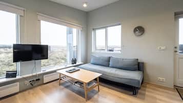 Comfort Cabin, 1 Double Bed with Sofa bed, Hot Tub (7A) | Living area | 32-inch LCD TV with digital channels, TV, Netflix