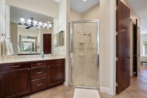 Combined shower/tub, hair dryer, towels, toilet paper