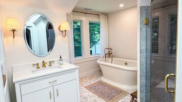 Bathtub, hair dryer, towels, soap