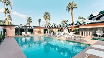 Outdoor pool, pool umbrellas, sun loungers