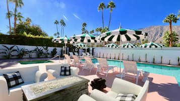 Outdoor pool, pool umbrellas, sun loungers