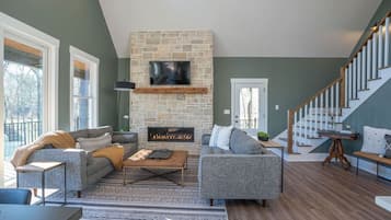 Smart TV, fireplace, books