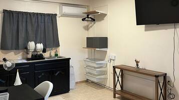 Basic Studio | Living area | 43-inch Smart TV with cable channels, TV