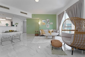 Comfort Apartment | Living area | 32-inch flat-screen TV with cable channels, TV