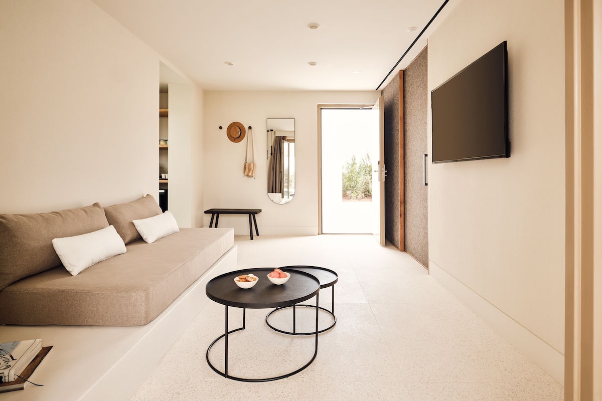 harmonia junior balcony suite | living area | 40-inch smart tv with satellite channels, tv