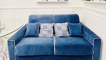 Apartment | Living area | 30-inch TV with digital channels