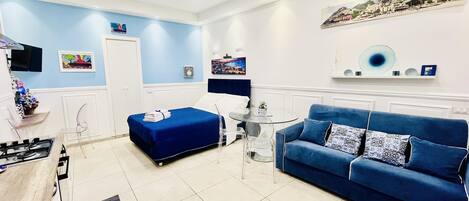 Apartment | Living area | 30-inch TV with digital channels