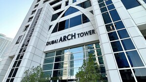 A modern building with the name "DUBAI ARCH TOWER" prominently displayed. - Marco Polo - Striking Lake Views at JLT | 1 BR | 2 Balconies (Dubai)