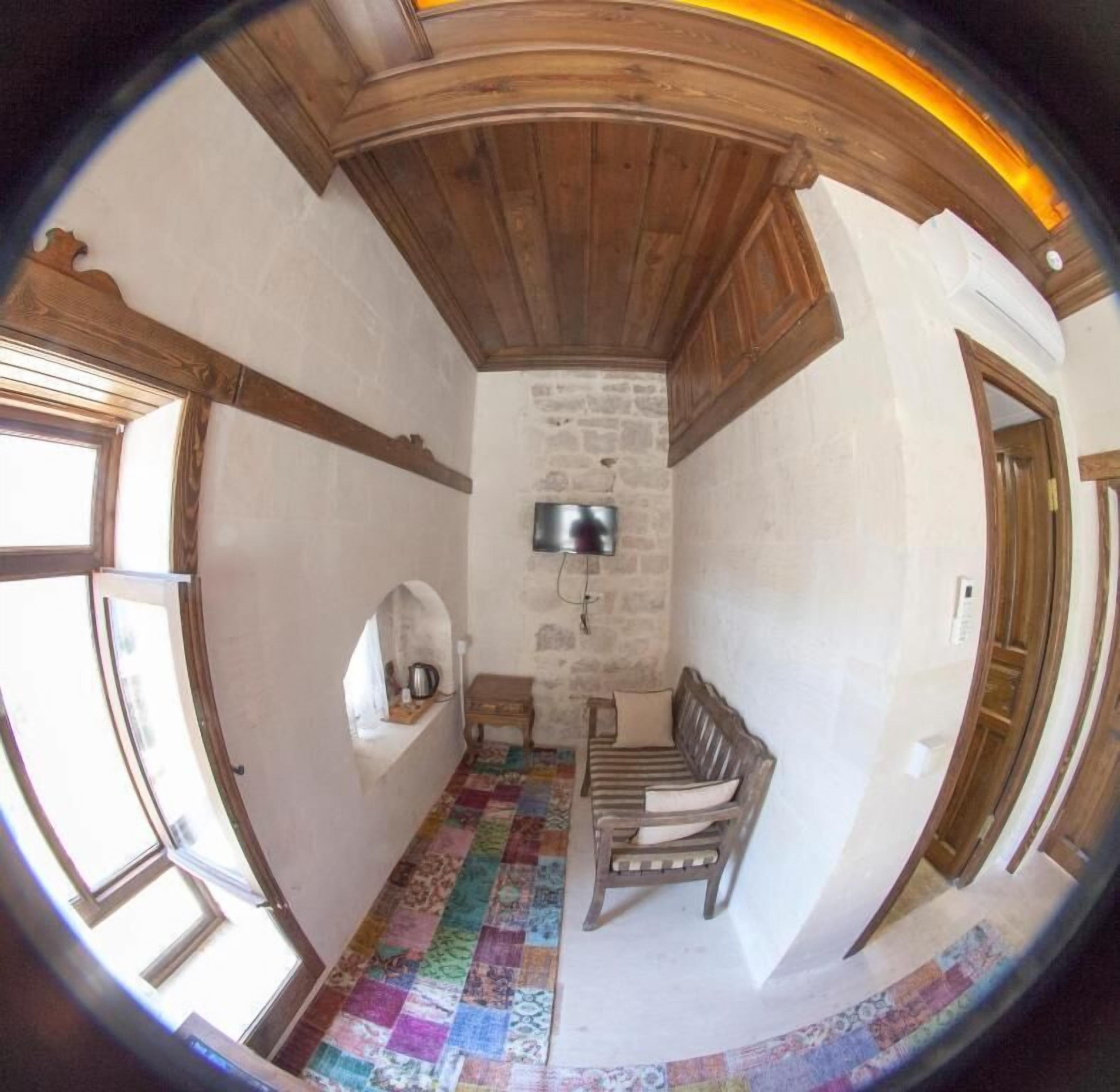 deluxe double room | living area | 23-inch led tv with satellite channels, tv, computer monitors