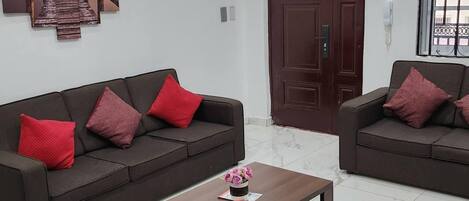 Apartment | Living area | 30-inch TV with digital channels