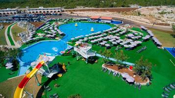 Outdoor pool, a heated pool, sun loungers