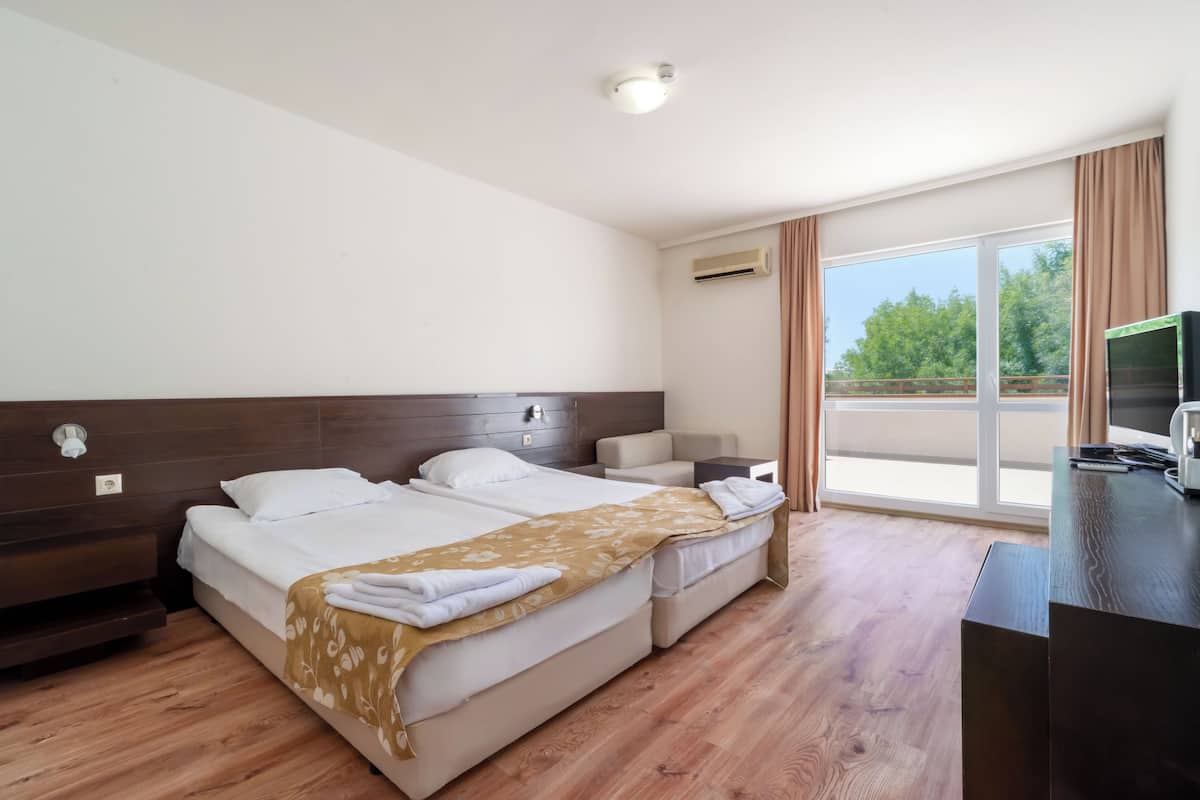 Family Room | 2 bedrooms, free minibar items, in-room safe, desk