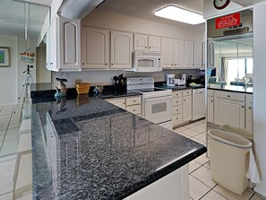 Condo, Multiple Beds, Balcony, Ocean View | Private kitchen | Fridge, microwave, oven, stovetop