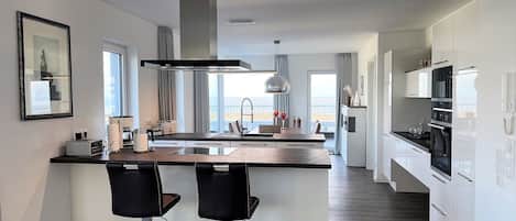 Coffee/tea maker, fridge, microwave, oven