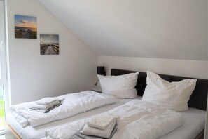 5 bedrooms, WiFi, bed sheets - House No. 21, Holiday home Fischerhus - Modern vacation home, fireplace, sauna, south (Wangerland)